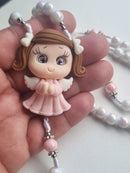 Terço Anjinho rosa TR234